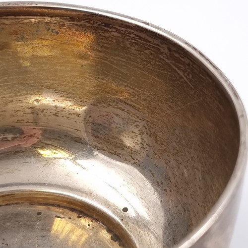 37 - A sterling silver dish rim with slight split. Hallmarked London, 1919. With faint inscription, easil... 