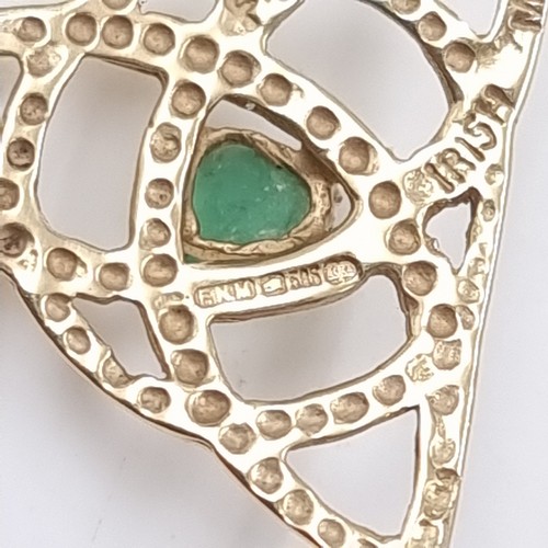 38 - Star Lot: A 14 carat gold 585 Celtic style pendant set with centre emerald gemstone. Weight 1.55 gra... 
