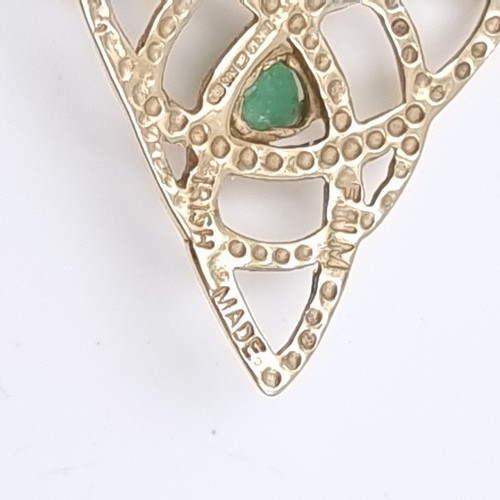 38 - Star Lot: A 14 carat gold 585 Celtic style pendant set with centre emerald gemstone. Weight 1.55 gra... 