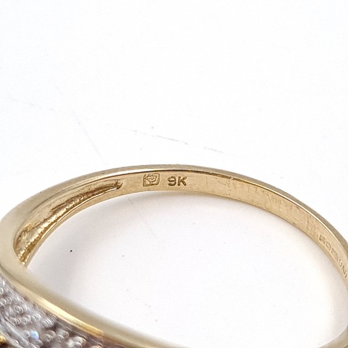 1 - Star Lot: A stunning iolite and diamond ring set in nine carat gold. Size R. Weight 2.37 grams. This... 