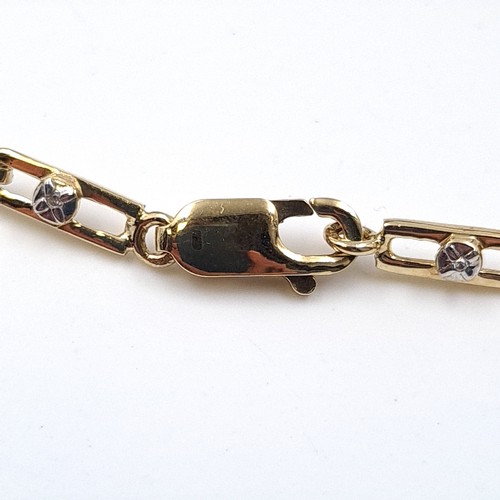 2 - Star Lot: A fine diamond and diopside bracelet set nine carat gold. Weight 5.66 grams.