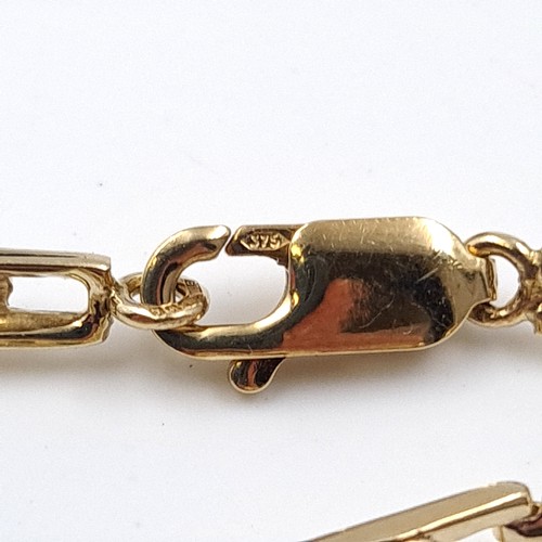 2 - Star Lot: A fine diamond and diopside bracelet set nine carat gold. Weight 5.66 grams.