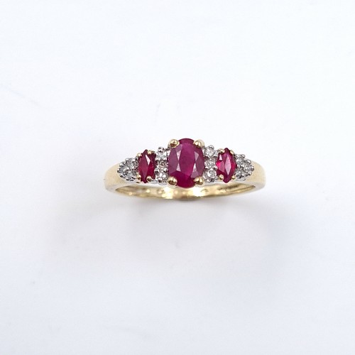 3 - Star Lot: A beautiful ruby and diamond ring set in nine carat gold. Size O. Weight 1.99 grams.