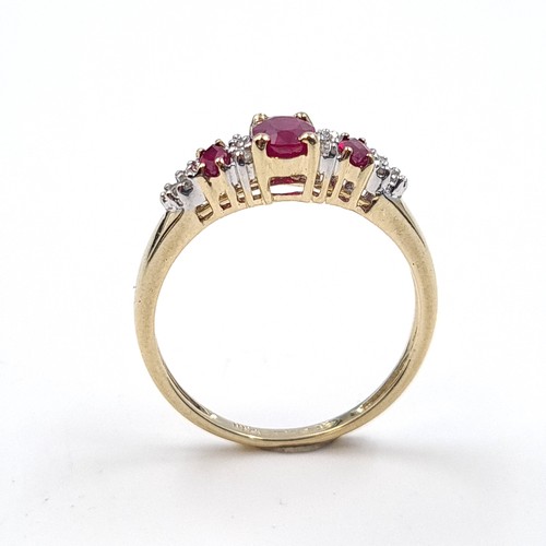 3 - Star Lot: A beautiful ruby and diamond ring set in nine carat gold. Size O. Weight 1.99 grams.