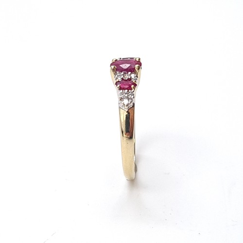 3 - Star Lot: A beautiful ruby and diamond ring set in nine carat gold. Size O. Weight 1.99 grams.