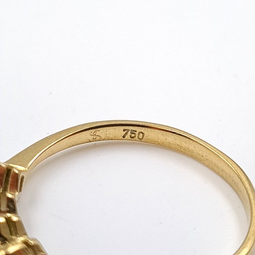 6 - Star Lot: An 18 carat gold emerald half eternity ring. Size O. Weight 1.86 grams.