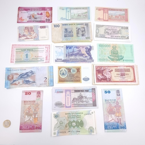 A large collection of assorted international bank notes many in extra ...