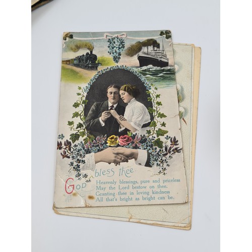 A large collection of over 80 assorted coloured and b&w postcards ...