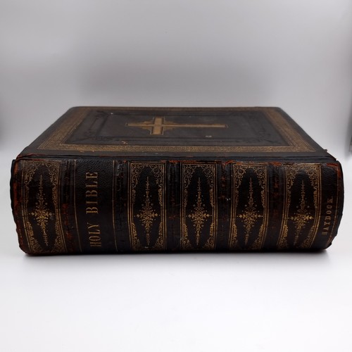 1223 - Star Lot: A superb example of an antique very large Holy Bible with beautiful plates, protected by r... 