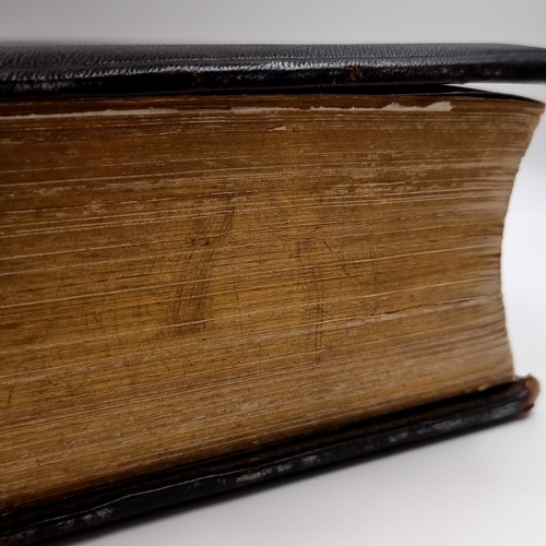 1223 - Star Lot: A superb example of an antique very large Holy Bible with beautiful plates, protected by r... 