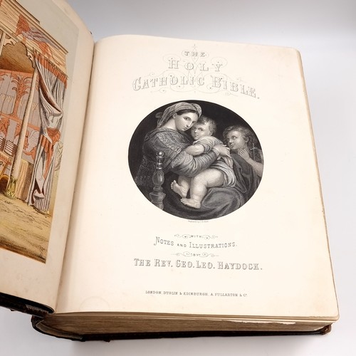 1223 - Star Lot: A superb example of an antique very large Holy Bible with beautiful plates, protected by r... 