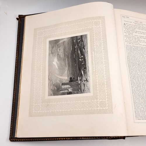 1223 - Star Lot: A superb example of an antique very large Holy Bible with beautiful plates, protected by r... 