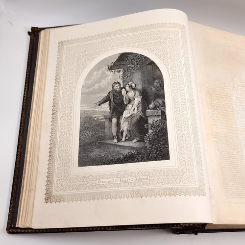 1223 - Star Lot: A superb example of an antique very large Holy Bible with beautiful plates, protected by r... 