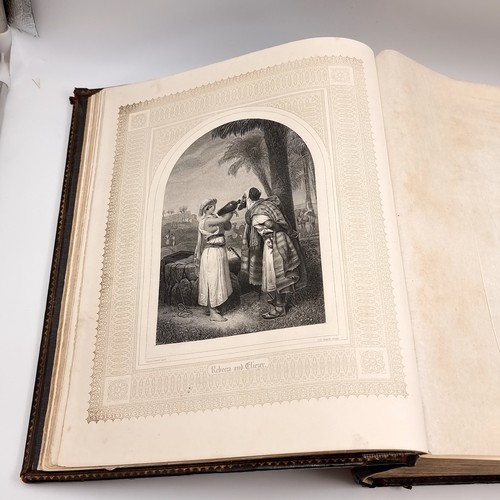 1223 - Star Lot: A superb example of an antique very large Holy Bible with beautiful plates, protected by r... 