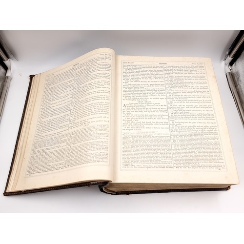 1223 - Star Lot: A superb example of an antique very large Holy Bible with beautiful plates, protected by r... 