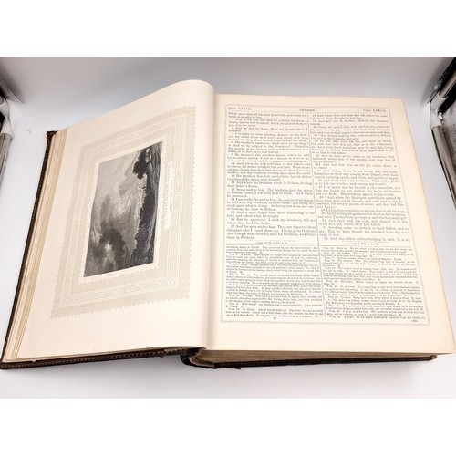 1223 - Star Lot: A superb example of an antique very large Holy Bible with beautiful plates, protected by r... 