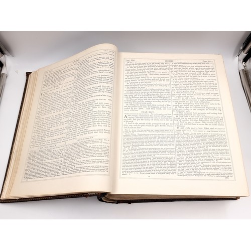 1223 - Star Lot: A superb example of an antique very large Holy Bible with beautiful plates, protected by r... 