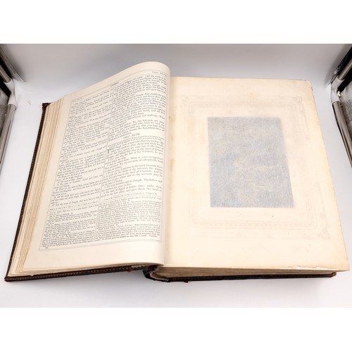 1223 - Star Lot: A superb example of an antique very large Holy Bible with beautiful plates, protected by r... 