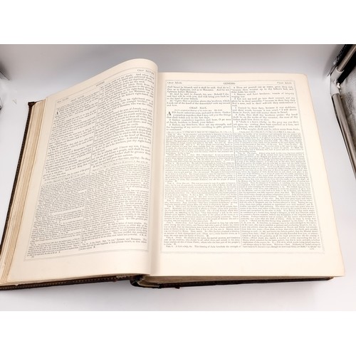 1223 - Star Lot: A superb example of an antique very large Holy Bible with beautiful plates, protected by r... 