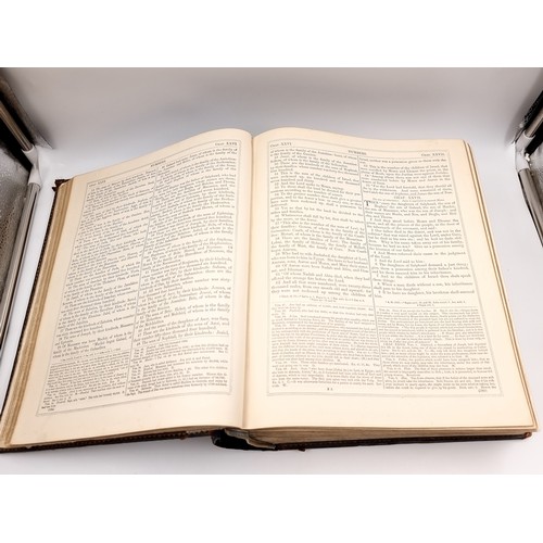 1223 - Star Lot: A superb example of an antique very large Holy Bible with beautiful plates, protected by r... 