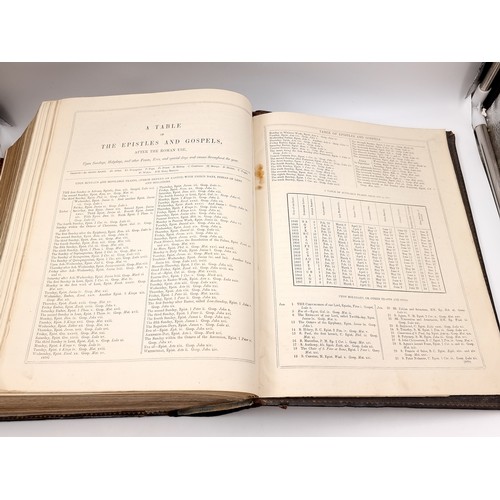 1223 - Star Lot: A superb example of an antique very large Holy Bible with beautiful plates, protected by r... 