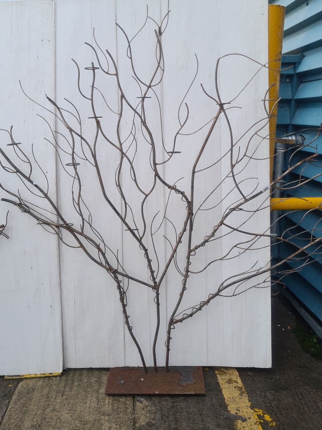 Pair of large freestanding, leafless tree sculptures, welded wrought ...