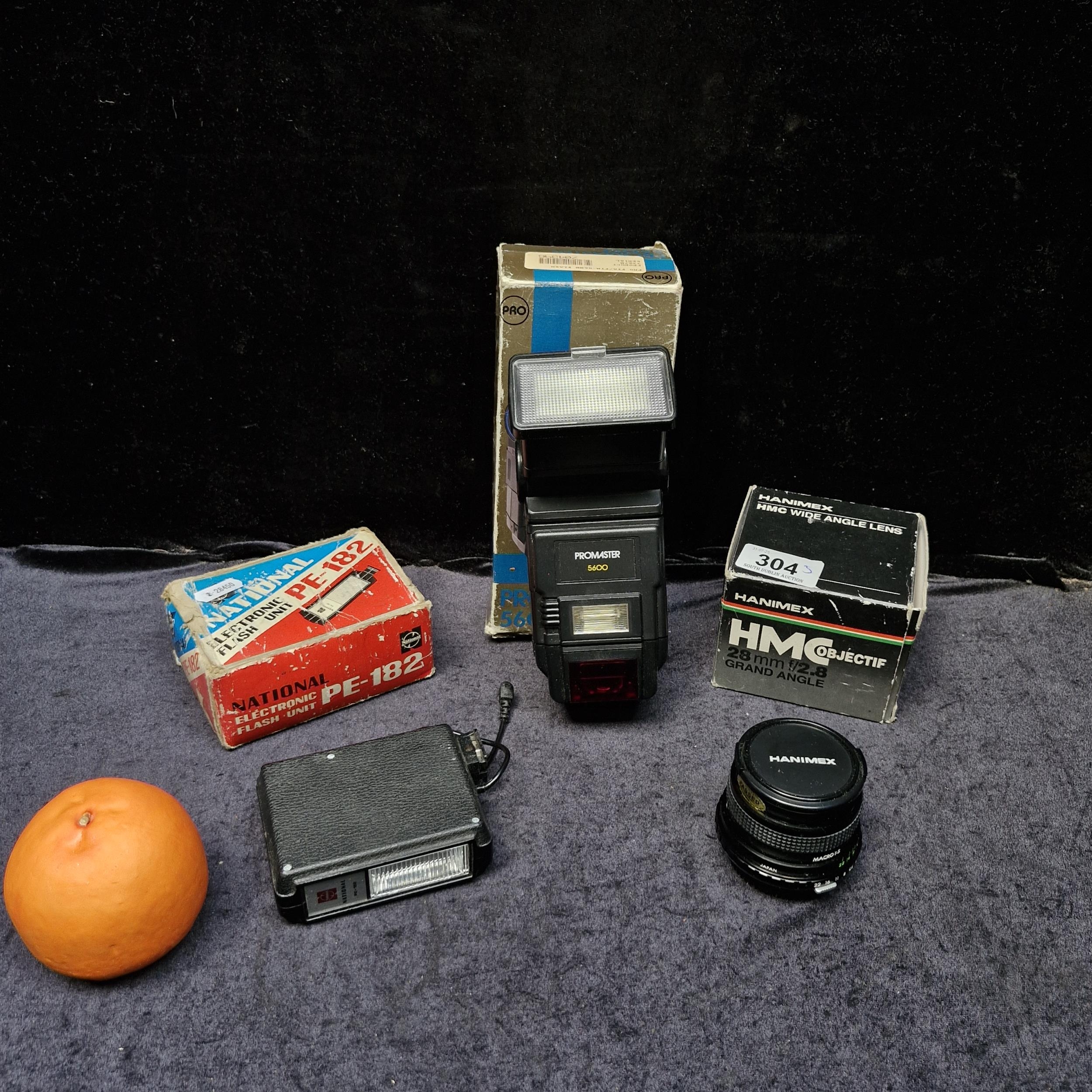 Three camera equipment items including a Hanimex HMC wide angle lens ...