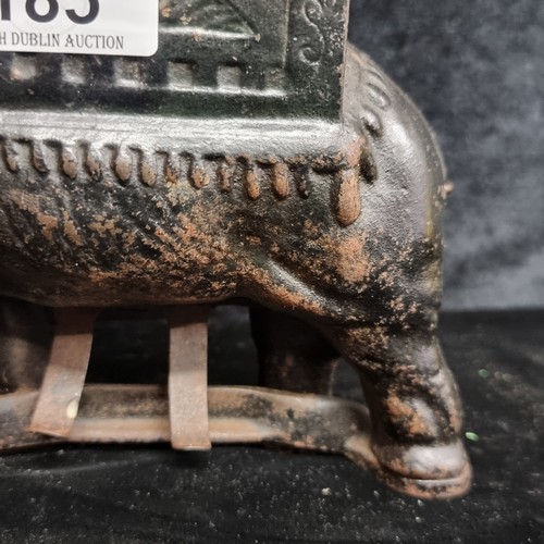 antique elephant cigarette roller Star lot: A fabulous antique 1920s cast iron Elephant cigarette roller  dispenser. Tail rotates to tu