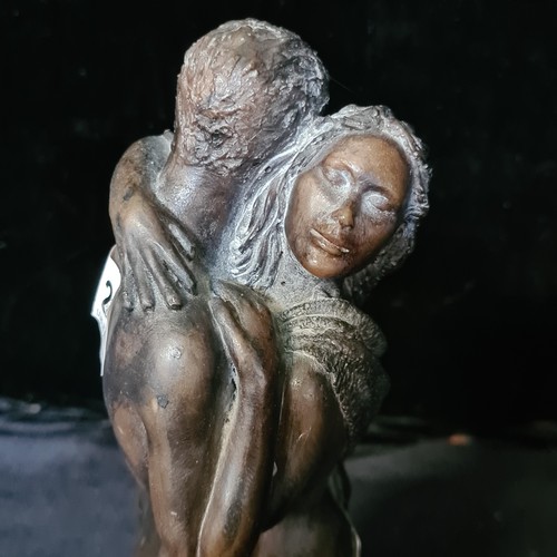 A beautiful sculpture titled 'The Waltz' by Claire Heath after the