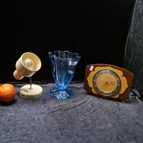 Group of three: Smiths English Clocks Ltd 200-250V electric mantel clock in wooden case, faceted blue pressed-glass vase, and cream plastic adjustable desk lamp.