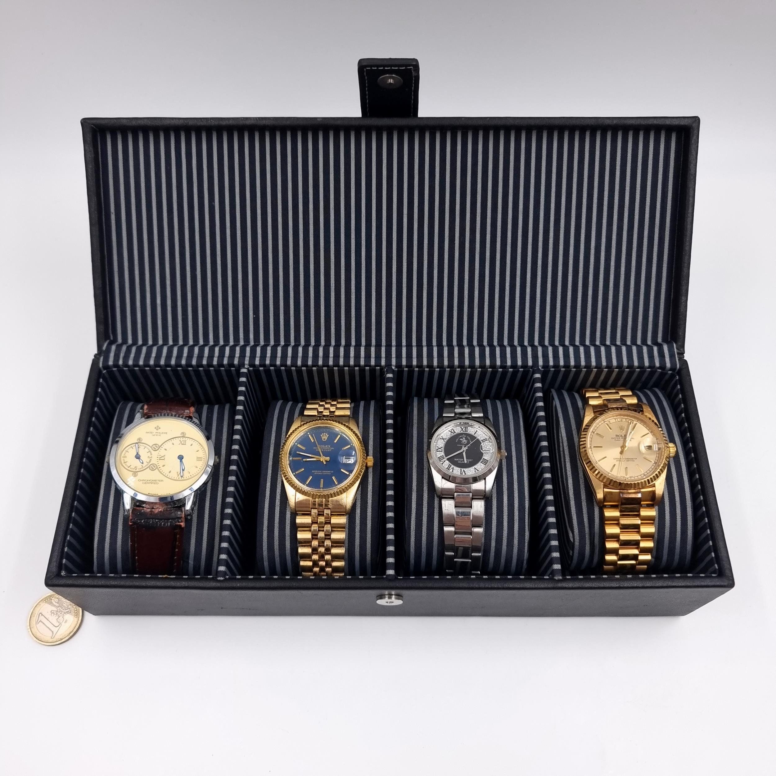 A selection of reproduction watches in a Jasper Conrad watch box.
