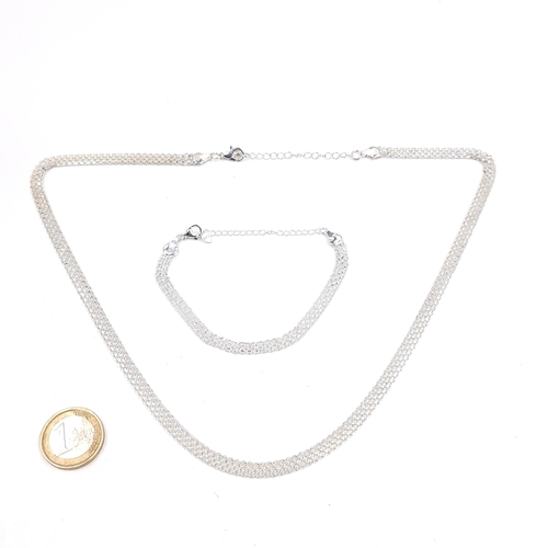 A Sterling Silver matching gate link necklace and bracelet. - Total weight - 15.7 grams.