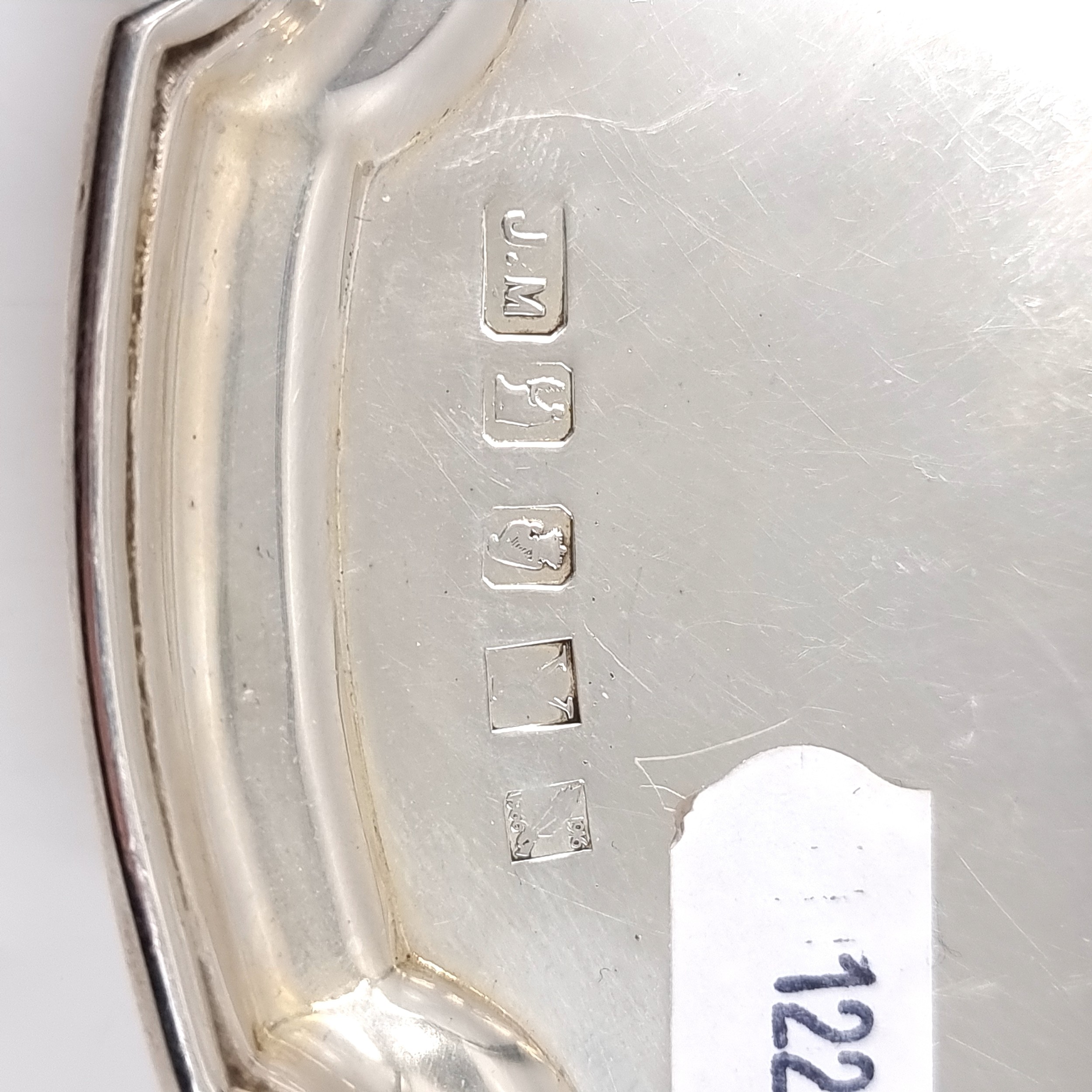 An Irish Silver Tray with Pie crust rim dated 1966 with special sword ...