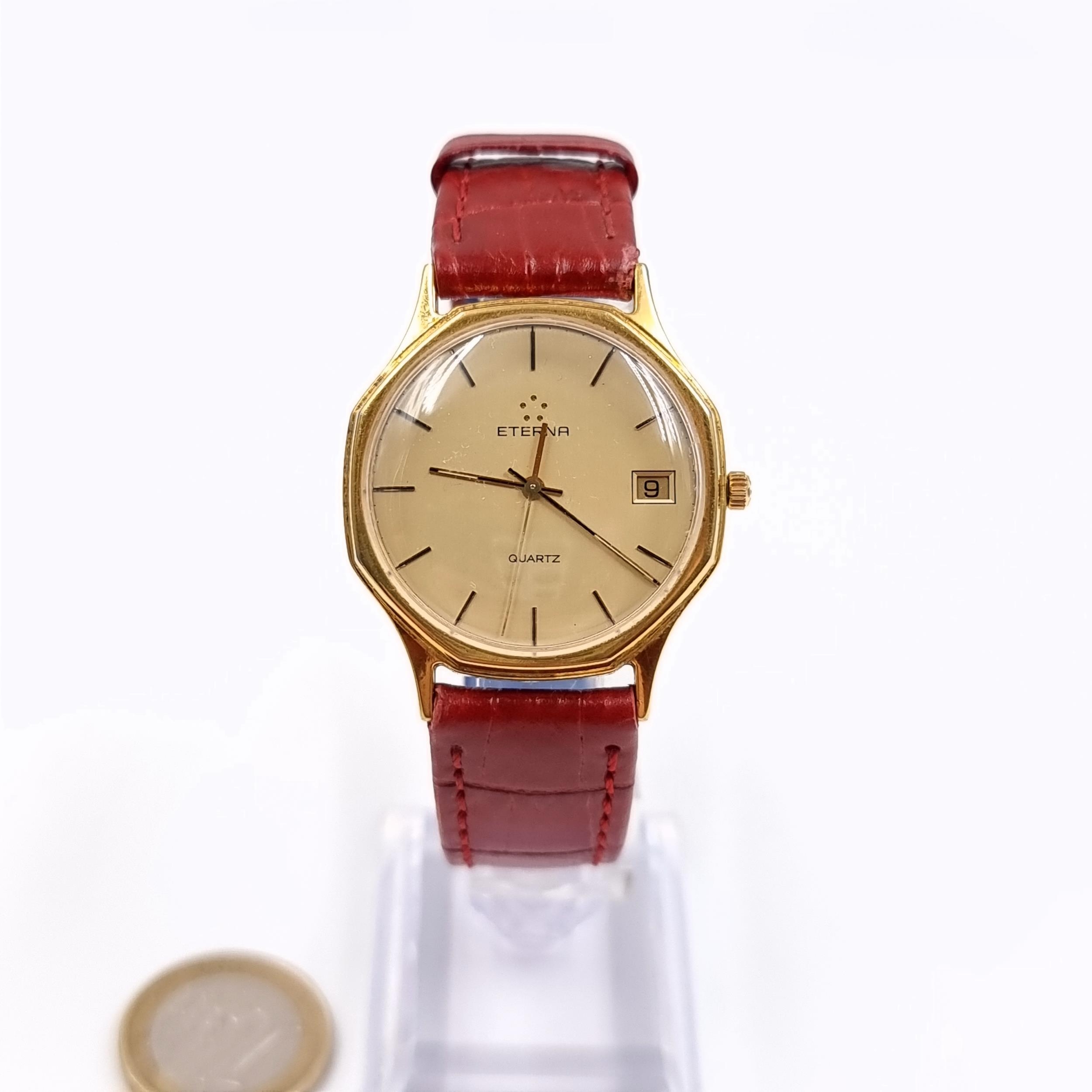 An Eterna Quartz wristwatch with baton dial, sweep second hand and ...