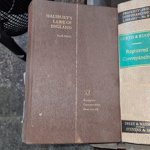 Set of 9 British legal reference volumes including Halsbury’s Laws of ...