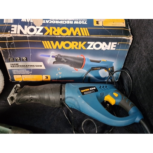 Group of three corded power tools comprising Workzone 710 W ...