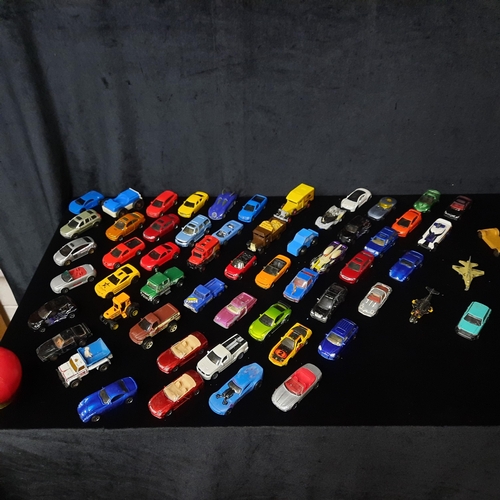 A bag containing a large selection of approx. 25 model toy cars ...