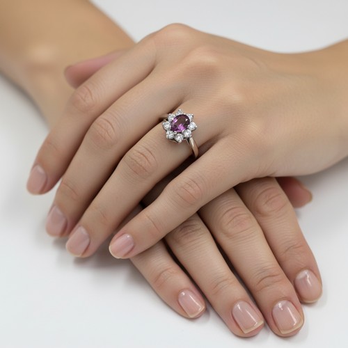 3 - A nine carat gold / silver gemstone ring. Size - Q 1/2,Weight - 2.18 grams.