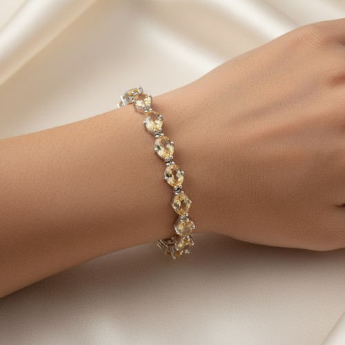 22 - A very pretty Sterling Silver citrine line bracelet. Weight - 13.2 grams