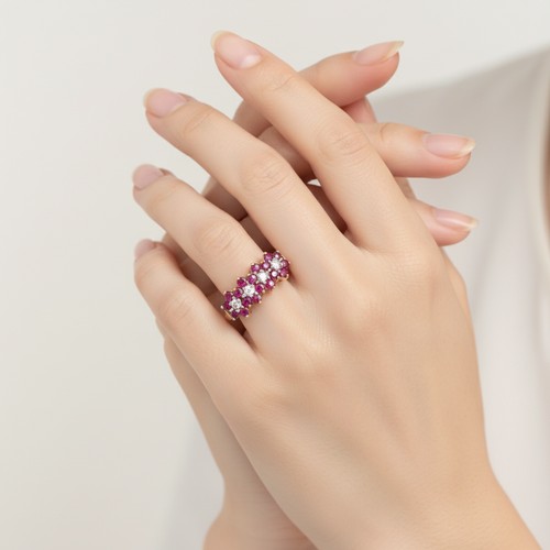 34 - Star Lot : A nine carat gold Ruby and Diamond gemstone ring. Size - K, Weight - 2.45 grams.