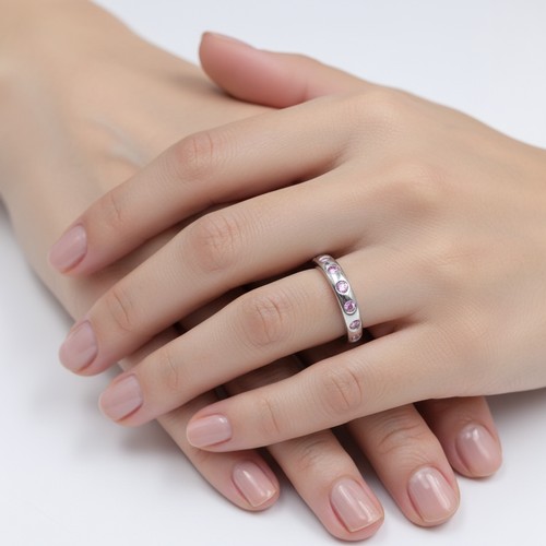 47 - Star Lot : A nine carat white gold pink Topaz set ring. Size - O 1/12, Weight - 1.87 grams.