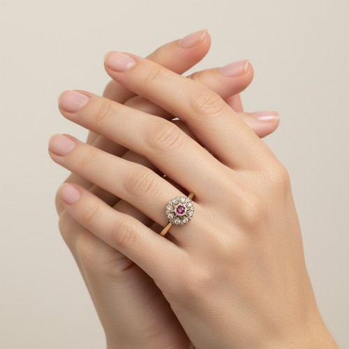 51 - Star lot: An antique Ruby and Diamond Cluster ring set in nine carat gold. Hallmarks indistinct. Siz... 