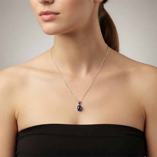 56 - A Cabochon Sapphire gemstone pendant necklace with Simply sterling Silver chain. Weight - 3.77 grams... 