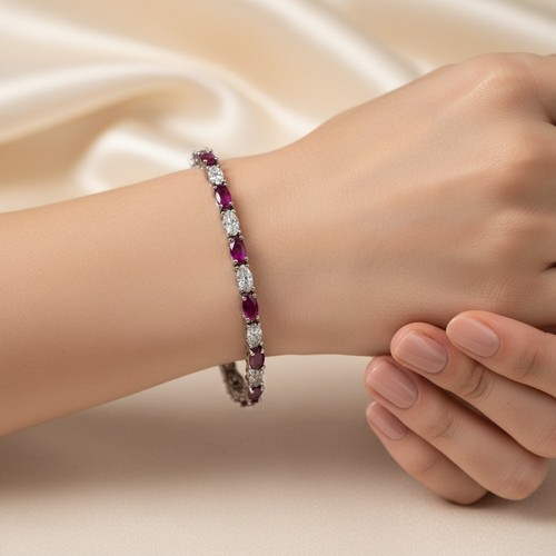 60 - Star Lot : A very Pretty Ruby and Diamond gemstone bracelet. Set in Sterling Silver. Diamond stamped... 