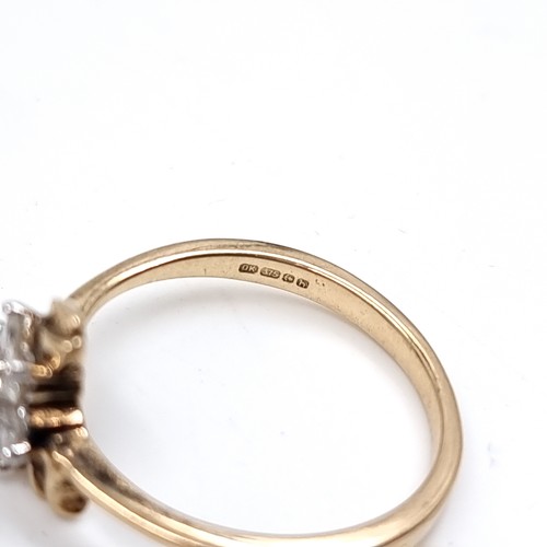 1 - Star Lot : A lovely nine carat gold Diamond Daisy cluster ring. Size - N. Weight 2.23 grams