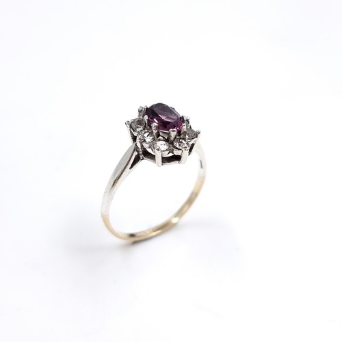 3 - A nine carat gold / silver gemstone ring. Size - Q 1/2,Weight - 2.18 grams.
