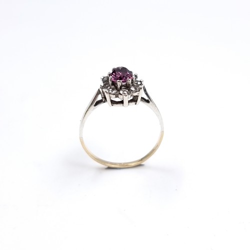 3 - A nine carat gold / silver gemstone ring. Size - Q 1/2,Weight - 2.18 grams.