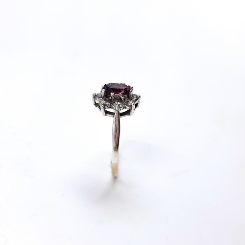 3 - A nine carat gold / silver gemstone ring. Size - Q 1/2,Weight - 2.18 grams.