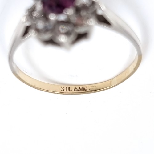 3 - A nine carat gold / silver gemstone ring. Size - Q 1/2,Weight - 2.18 grams.