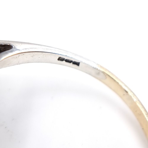 3 - A nine carat gold / silver gemstone ring. Size - Q 1/2,Weight - 2.18 grams.